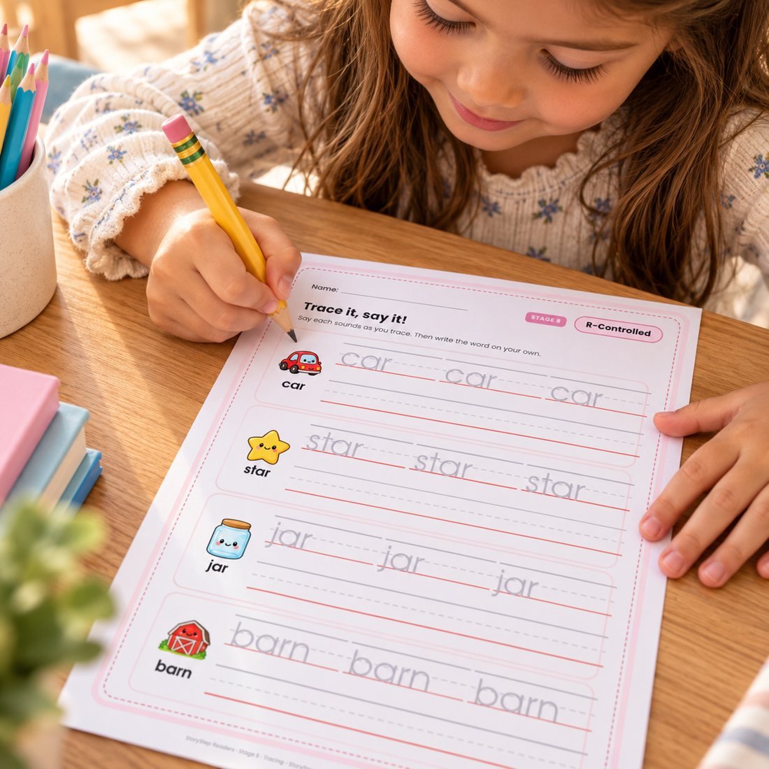Girl tracing words on a tracing page